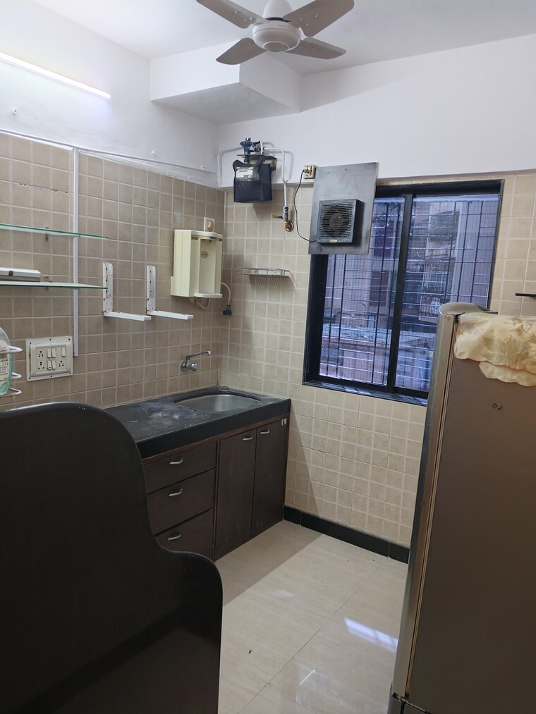 Team Area, dn nagar 2 Bedroom 590 Sq.Ft. Apartment In Dn Nagar Mumbai 9646436