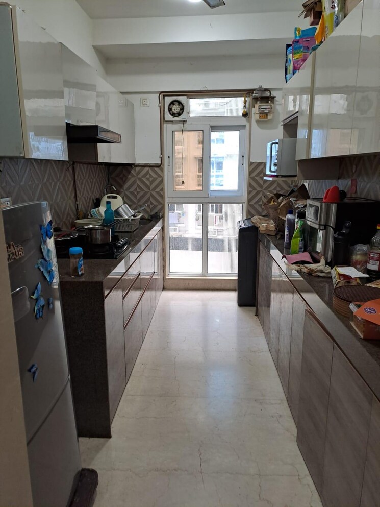 Kitchen, dn nagar 2 Bedroom 690 Sq.Ft. Apartment In Dn Nagar Mumbai 9646445