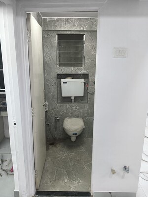 Bathroom in 1 BHK Apartment at Raj Niwas Malad West, Malad West – for Sale