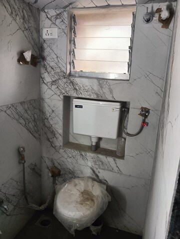 Bathroom in 1 BHK Apartment at Raj Niwas Malad West, Malad West – for Sale