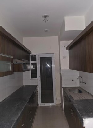 Kitchen in 2 BHK Apartment at MCC Signature Heights, Raj Nagar Extension – for Rent