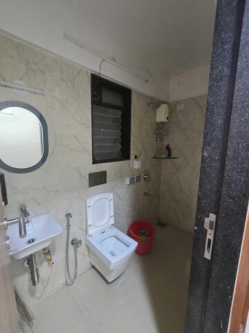 Bathroom in 2 BHK Apartment at DLH Sorrento, Veera Desai Road – for Rent