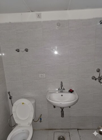 Bathroom in 2 BHK Apartment at MCC Signature Heights, Raj Nagar Extension – for Rent