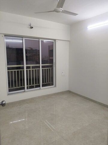 Room in 1.5 BHK Apartment at Chandiwala Pearl Regency, Andheri West – for Rent