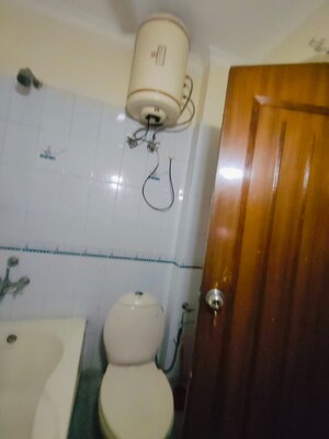 Bathroom in 3 BHK Apartment at Vijay Ratan Vihar, Sector 15 – for Rent