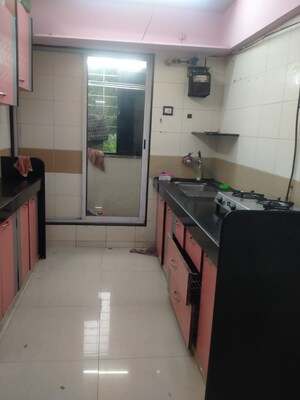 Kitchen in 2 BHK Apartment at Atul Blue Excellency, Goregaon West – for Rent