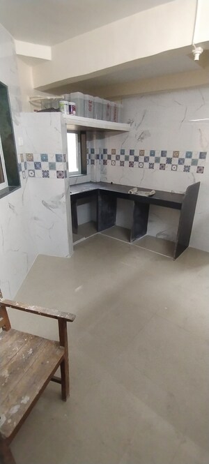 Kitchen in 1 BHK Apartment at Shree Sadguru CHS, Kalwa – for Sale