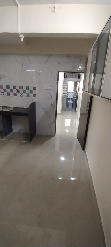 Kitchen in 1 BHK Apartment at Shree Sadguru CHS, Kalwa – for Sale
