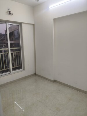 Room in 1.5 BHK Apartment at Chandiwala Pearl Regency, Andheri West – for Rent