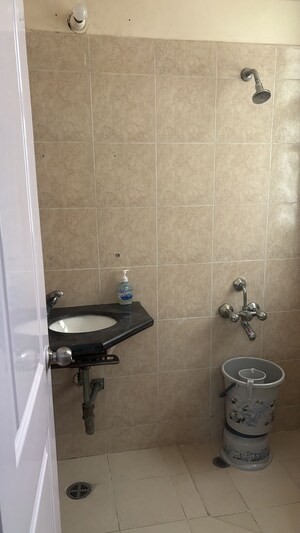 Bathroom in 3 BHK Apartment at Orchid Petals, Sector 49 – for Rent