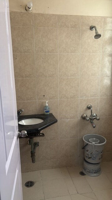 Bathroom in 3 BHK Apartment at Orchid Petals, Sector 49 – for Rent