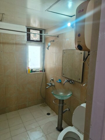 Bathroom in 3 BHK Apartment at Orchid Petals, Sector 49 – for Rent