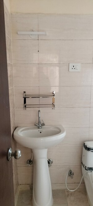 Bathroom in 2 BHK Apartment at Value Meadows Vista, Raj Nagar Extension – for Rent