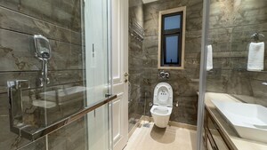 Bathroom in 4 BHK Apartment at Safdarjung Enclave – for Rent