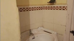 Bathroom in 1 BHK Apartment at Raviraj Rakshak Nagar, Kharadi – for Rent