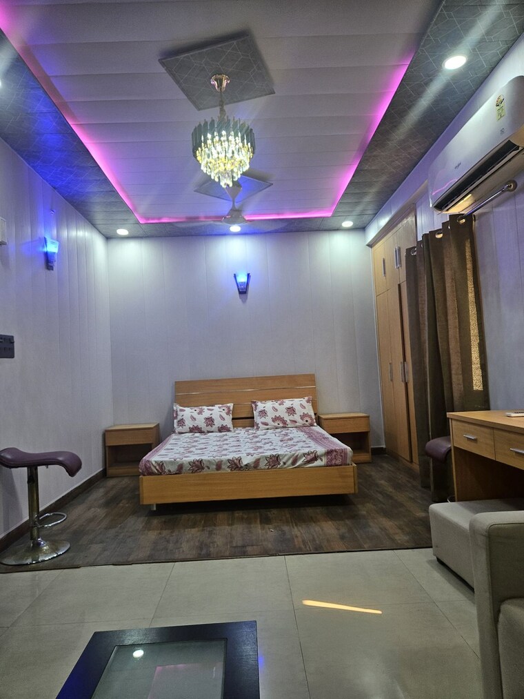 Living Room, supertech-czar-suites Studio 450 Sq.Ft. Apartment In Omicron I Greater Noida Greater Noida 9647211