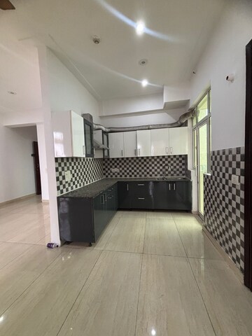 Kitchen in 3.5 BHK Apartment at Amrapali Zodiac, Sector 120 – for Sale