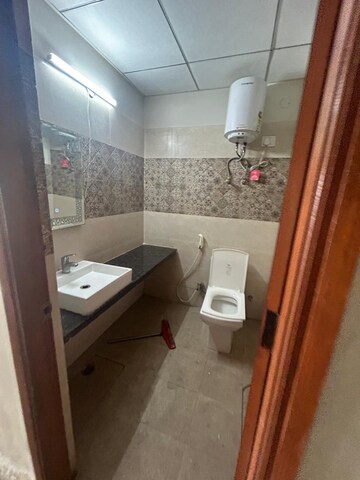 Bathroom in 1 BHK Apartment at Paramount Golfforeste, Zeta I Greater Noida – for Rent