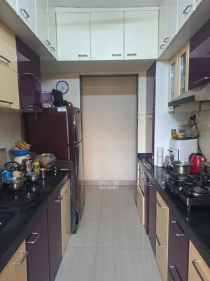 Kitchen in 2 BHK Apartment at Hubtown Greenwoods, Vartak Nagar – for Sale