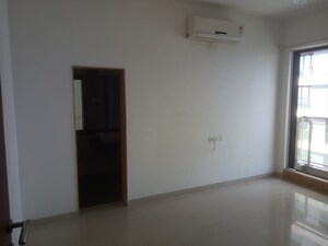Room in 2.5 BHK Apartment at Rustomjee Elanza, Malad West – for Rent