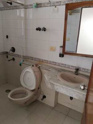 Bathroom in 3 BHK Apartment at ATS Green II, Sector 50 – for Rent