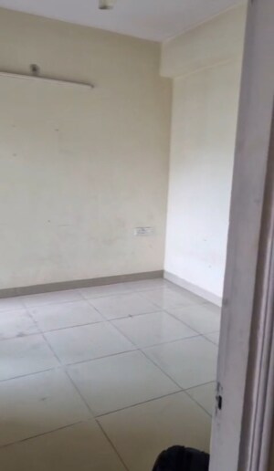 Room in 2 BHK Apartment at Charms Castle, Raj Nagar Extension – for Rent
