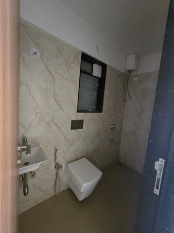 Bathroom in 2 BHK Apartment at Pratham ARC Aura, Andheri West – for Rent