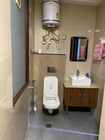 Bathroom in 4 BHK Builder Floor at Vipul Square, Sushant Lok I – for Rent