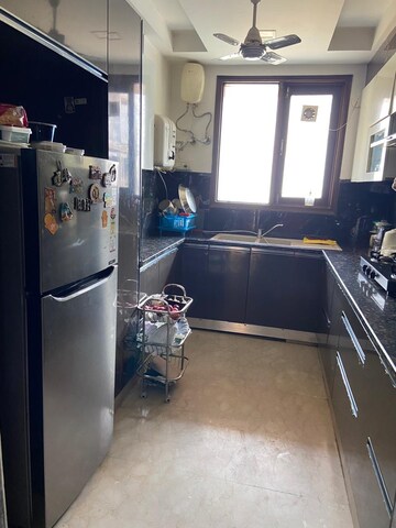 Kitchen in 4 BHK Builder Floor at Vipul Square, Sushant Lok I – for Rent