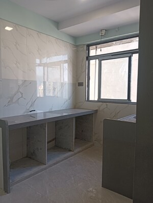 Kitchen in 1 BHK Apartment at Rohan Lifescapes Arihant, Girgaon – for Sale