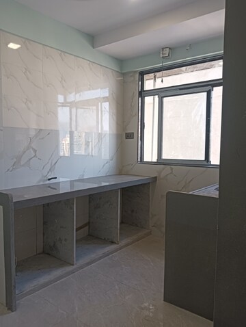 Kitchen in 1 BHK Apartment at Rohan Lifescapes Arihant, Girgaon – for Sale