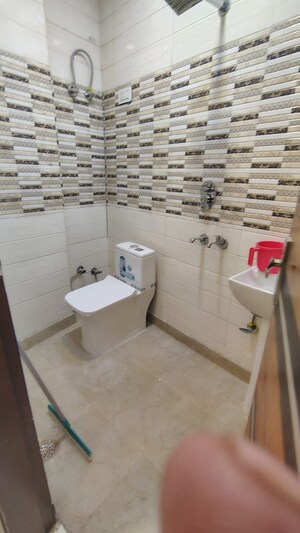 Bathroom in 3 BHK Builder Floor at Dwarka Mor – for Rent
