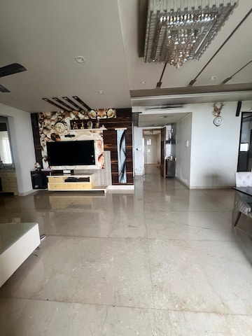 Living Room in 4 BHK Apartment at The Wadhwa Palm Beach Residency, Nerul Sector 4 – for Sale