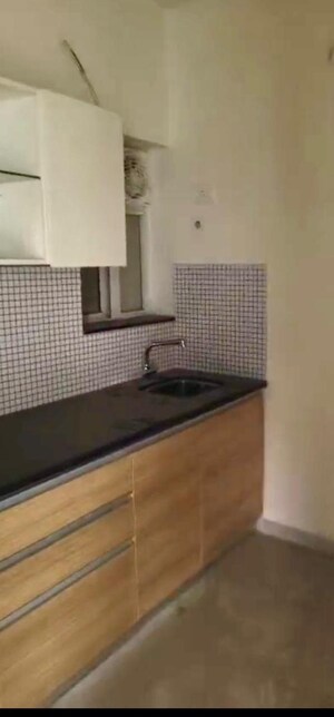 Kitchen in 1 BHK Apartment at Omkar Signet, Malad East – for Sale