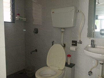 Bathroom in 1 BHK Apartment at Ecohomes Nai Roshni, Andheri East – for Rent