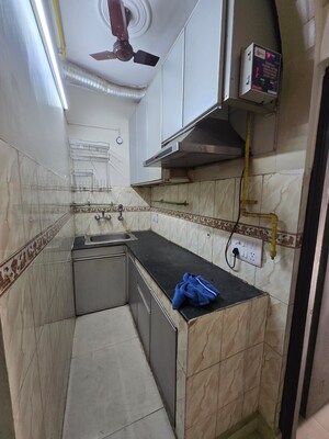 Kitchen in 1.5 BHK Apartment at Lajpat Nagar 4 – for Rent