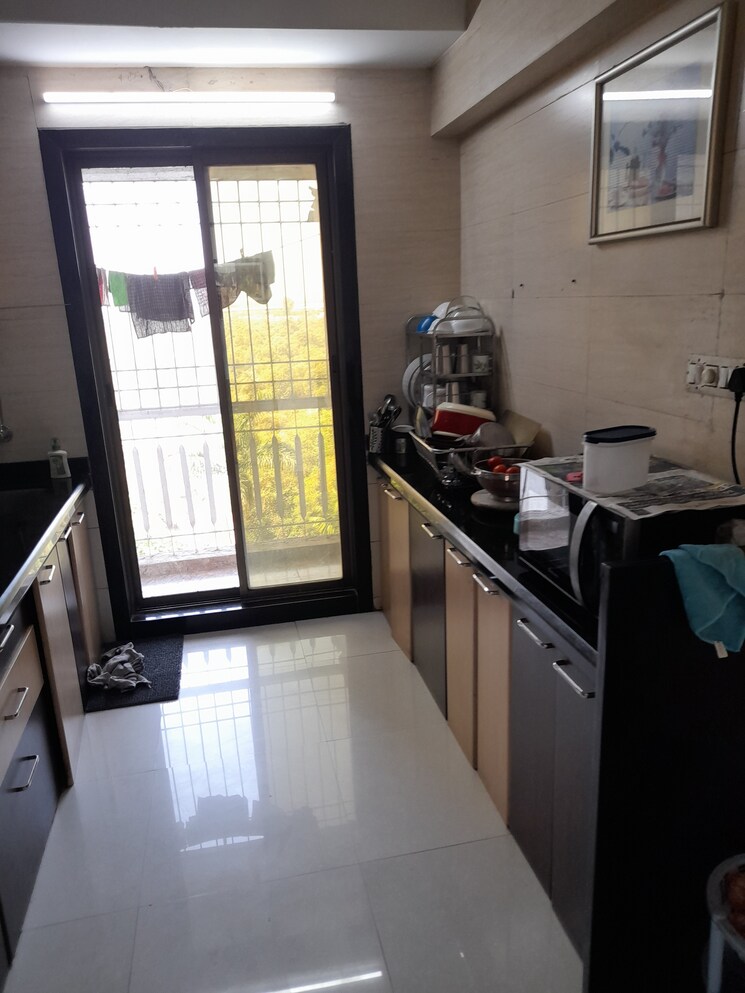 Kitchen, elite-grandeur 2 Bedroom 1205 Sq.Ft. Apartment In Kharghar Navi Mumbai 9648046