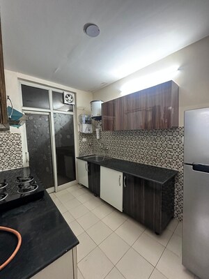 Kitchen in 3 BHK Apartment at Ansals Celebrity Greens, Sushant Golf City – for Rent