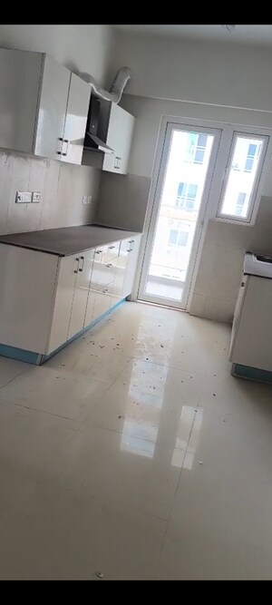 Kitchen in 2 BHK Apartment at Samridhi Luxuriya Avenue, Sector 150 – for Rent