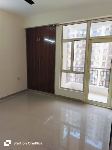 Master Bedroom in 2 BHK Apartment at Amrapali Golf Homes, Sector 4 Greater Noida – for Rent