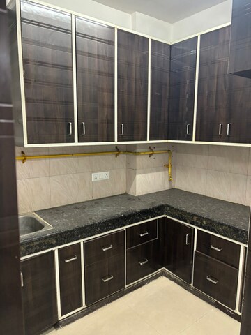 Kitchen in 2 BHK Apartment at Nilaya Greens, Raj Nagar Extension – for Rent