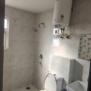 Bathroom in 3 BHK Apartment at Niho Saffron Scottish Garden, Ahinsa Khand 2 – for Rent
