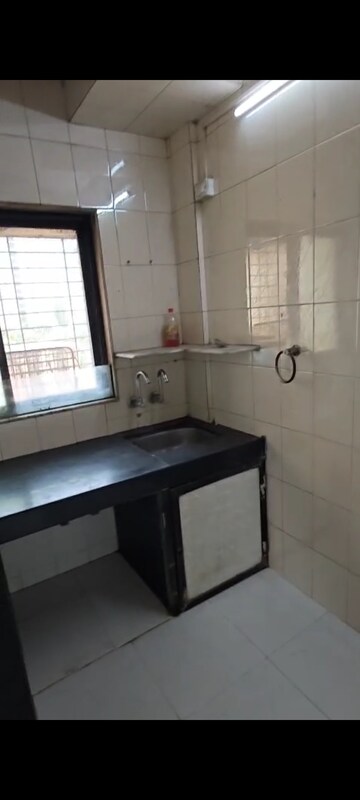 Kitchen in 1 BHK Apartment at Hiral Greens, Mira Road – for Sale