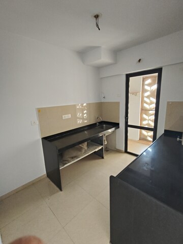 Kitchen in 2.5 BHK Apartment at Lodha Lakeshore Greens, Dombivli East – for Rent