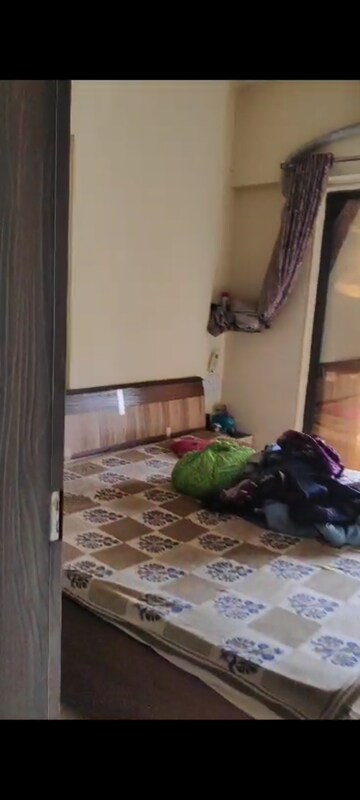 Bedroom in 1 BHK Apartment at Heena Presidency, Mira Road – for Sale