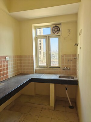 Kitchen in 2 BHK Apartment at Shree Vardhman Mantra, Sector 67 – for Rent