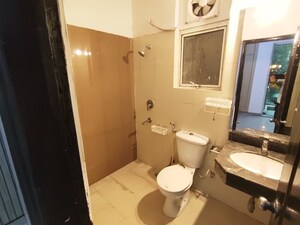 Bathroom in 3 BHK Builder Floor at Ansal API Esencia, Sector 67 – for Rent