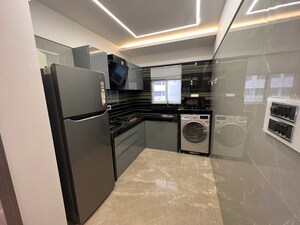 Kitchen in 1.5 BHK Apartment at Chandiwala Pearl Regency, Andheri West – for Sale