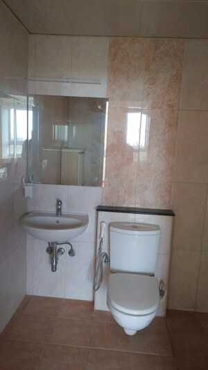 Bathroom in 3 BHK Apartment at Unishire Terraza, Thanisandra – for Rent