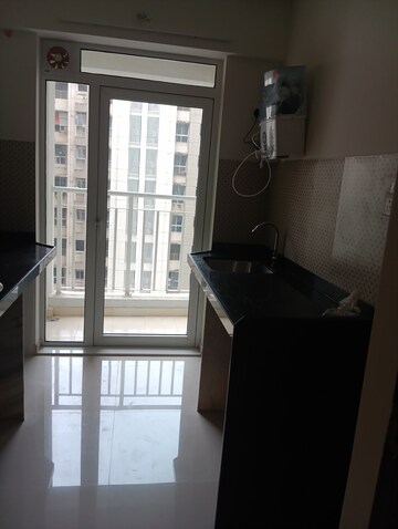 Kitchen in 1 BHK Apartment at Lodha Amara, Kolshet Road – for Rent